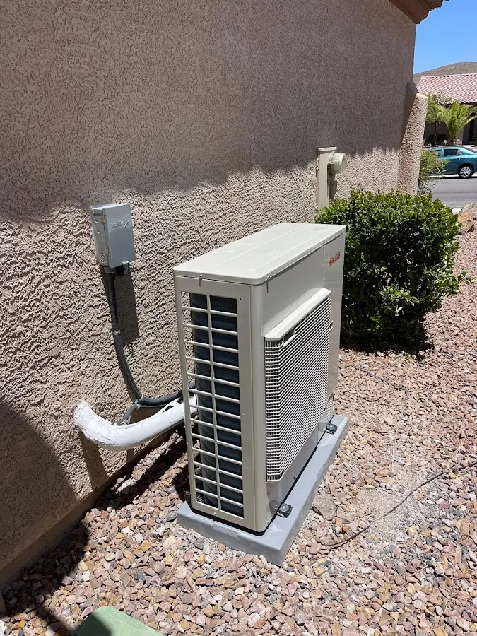 Residential air conditioning condenser unit in Midland
